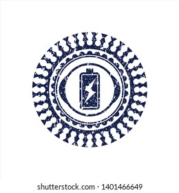 Blue battery charging icon inside distressed grunge seal