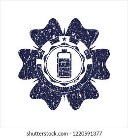 Blue battery icon inside rubber grunge seal