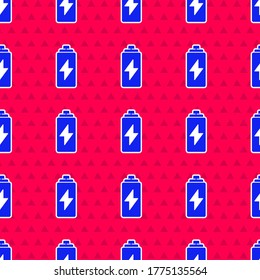Blue Battery icon isolated seamless pattern on red background. Lightning bolt symbol.  Vector Illustration