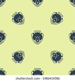 Blue Bear head on shield icon isolated seamless pattern on yellow background. Hunting trophy on wall.  Vector Illustration