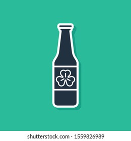 Blue Beer bottle with four leaf clover icon isolated on green background. Happy Saint Patricks day.  Vector Illustration