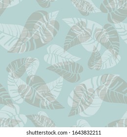 Blue and beige tropical leaves seamless pattern. Wrapping paper, fabric print texture.