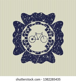 Blue bike icon inside rubber stamp