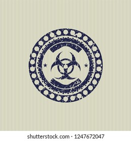 Blue biohazard icon inside distressed rubber grunge stamp