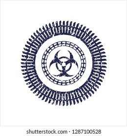 Blue biohazard icon inside rubber texture
