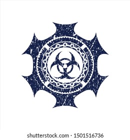 Blue biohazard icon inside rubber stamp with grunge texture