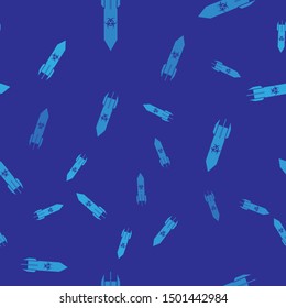 Blue Biohazard rocket icon isolated seamless pattern on blue background. Rocket bomb flies down.  Vector Illustration