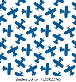 Blue biplanes isolated on white background. Cute monochrome seamless pattern. Top view. Vector flat graphic illustration. Texture.
