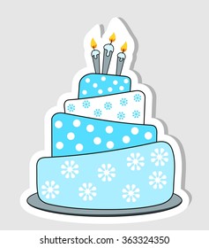 Blue birthday cake label with drop shadow and three lit candles