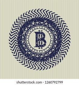 Blue bitcoin icon inside distressed rubber seal