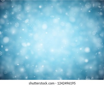 Blue blurred backdrop with snow for winter, Christmas and New Year design. Vector background.
