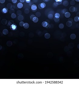 Blue bokeh blurred light. Abstract background with bokeh effect. Magic concept.