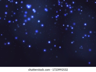 Blue bokeh light background. Sparkle effect with particles. Magic overlay dust. Glitter blur texture.