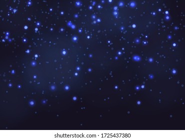 Blue bokeh light background. Sparkle effect with particles. Magic overlay dust. Glitter blur texture.