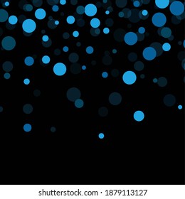 Blue bokeh lights on a black background.