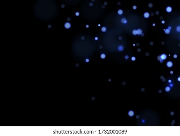 Blue bokeh. Overlay light background. Sparkle effect with particles. Magic stardust. Glitter blur texture.