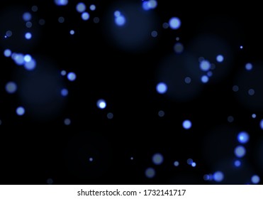 Blue bokeh. Overlay light background. Sparkle effect with particles. Magic stardust. Glitter blur texture.