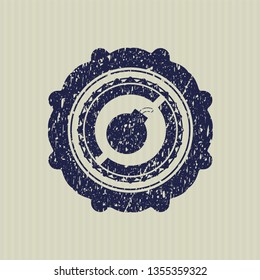 Blue bomb icon inside distressed rubber grunge texture stamp