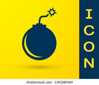 Blue Bomb ready to explode icon isolated on yellow background. Vector Illustration