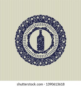 Blue bottle icon inside rubber seal with grunge texture