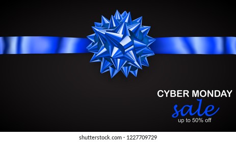 Blue bow with horizontal ribbon with shadow and inscription Cyber Monday Sale on black background