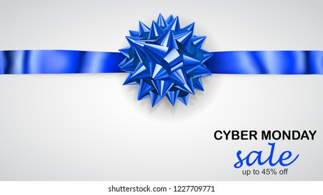 Blue bow with horizontal ribbon with shadow and inscription Cyber Monday Sale on white background