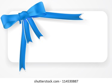 Blue bow and ribbons on a white card