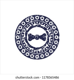 Blue bow tie icon inside distress rubber seal