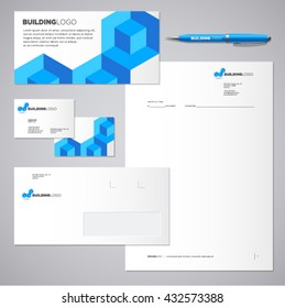 Blue brick building logo. Identity and logo. Blank, envelope, card, business cards.
