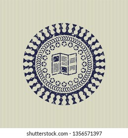 Blue brochure icon inside distress grunge style stamp