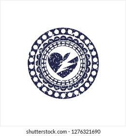 Blue broken heart icon inside rubber grunge seal