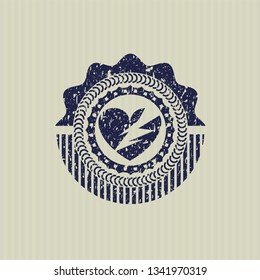 Blue broken heart icon inside distressed rubber stamp with grunge texture