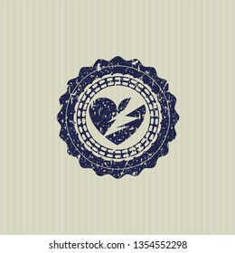Blue broken heart icon inside rubber stamp