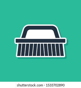 Blue Brush for cleaning icon isolated on green background.  Vector Illustration