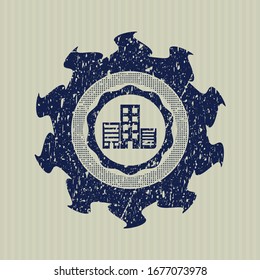 Blue buildings icon inside rubber texture