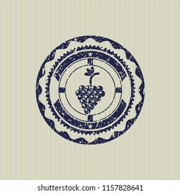 Blue bunch of grapes icon inside distress rubber grunge texture seal