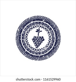 Blue bunch of grapes icon inside distressed rubber grunge texture stamp