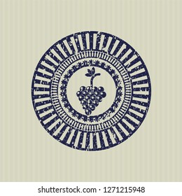 Blue bunch of grapes icon inside rubber grunge stamp