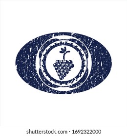 Blue bunch of grapes icon inside distress rubber grunge texture stamp