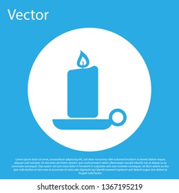 Blue Burning candle in candlestick icon on blue background. Old fashioned lit candle. Cylindrical aromatic candle stick with burning flame. White circle button. Flat design. Vector Illustration