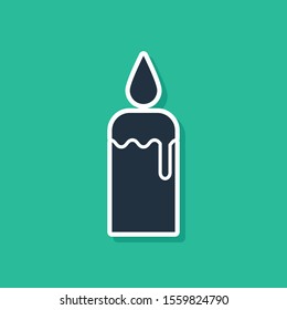Blue Burning candle in candlestick icon isolated on green background. Cylindrical candle stick with burning flame.  Vector Illustration