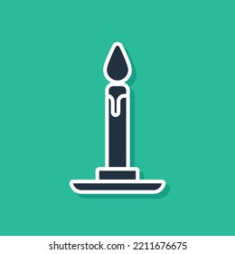 Blue Burning candle in candlestick icon isolated on green background. Cylindrical candle stick with burning flame.  Vector Illustration