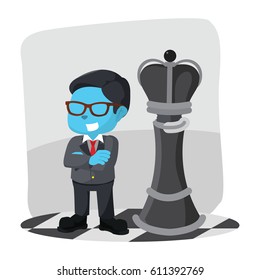 blue businessman standing infront king chess piece