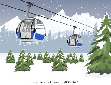 blue cable car lift at ski resort in winter in front of majestic mountains