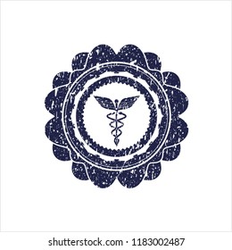 Blue Caduceus medical icon inside distress rubber grunge stamp