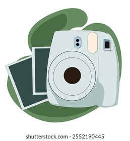 blue camera isolated on a greenbackground. Cute retro instant camera.