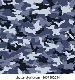 Blue camouflage pattern with dark spots. Repeat print. Seamless background.