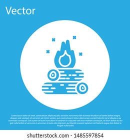 Blue Campfire icon isolated on blue background. Burning bonfire with wood. White circle button. Vector Illustration