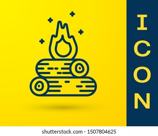Blue Campfire icon isolated on yellow background. Burning bonfire with wood.  Vector Illustration