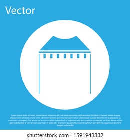 Blue Camping tent icon isolated on blue background. Carnival camping tent. Amusement park. White circle button. Vector Illustration